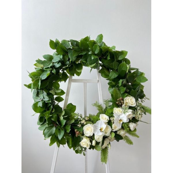 24 greenery sympathy wreath with a pocket of white floral